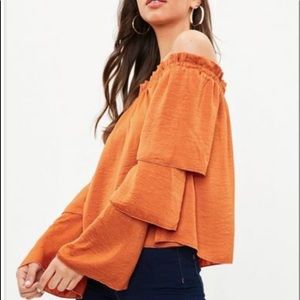 Misguided off the shoulder top